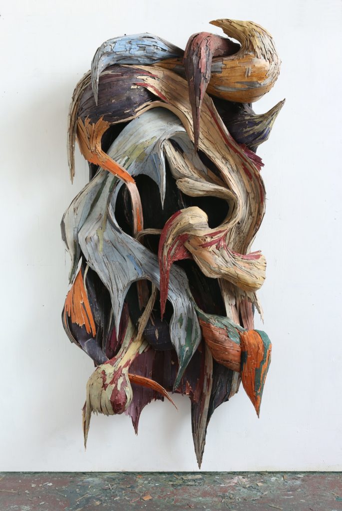 Henrique Oliveira, Xilempasto 24, 2022. Plywood and pigments, 92 1:8 x 46 1:16 x 16 1:8 inches
