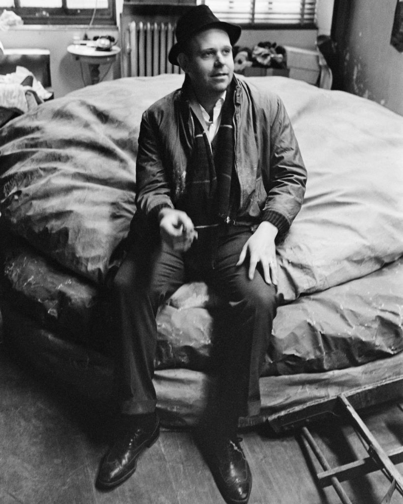 Claes Oldenburg in his room, NYC, March 1965. Yves Debraine Archives.